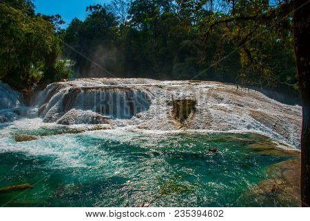 Turquoise-blue Water Of The Waterfall Agua Azul In Chiapas, Palenque, Mexico. Beautiful Scenery And 