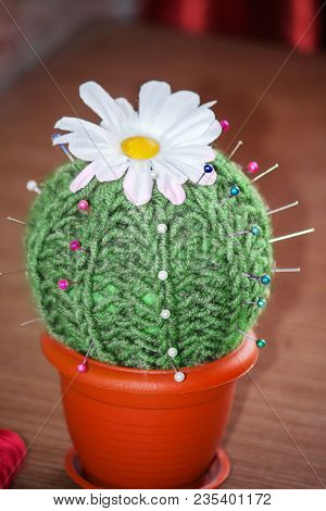 Cactus With Flower As A Handmade Needle Bed On Table. Sewing Accessories, Colored Spools Of Thread