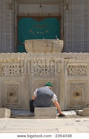 Old Muslim Man Preparing For The Prayer