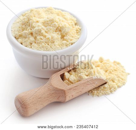 Closeup Of Gram Flour Closeup Over White Background
