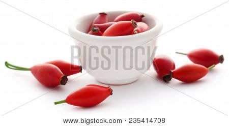 Rose Hips Of Madicinal Value In Ceramic Bowl