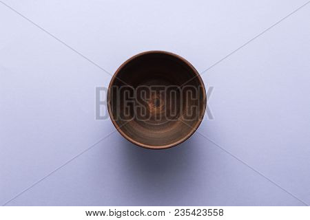 Empty Brown Plate On Pastel Purple Background, Top View, Flat Lay
