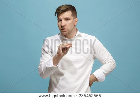 Secret, Gossip Concept. Young Man Whispering A Secret Behind His Hand. Businessman Isolated On Trend