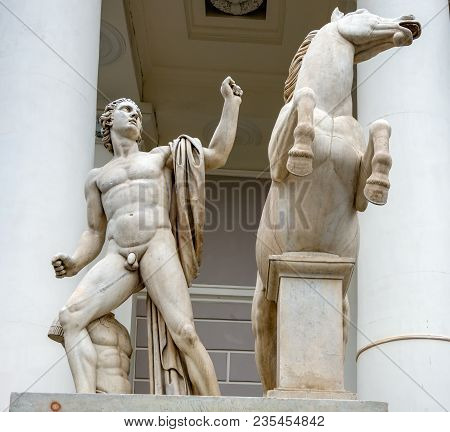 Russia, Saint Petersburg - August 18, 2017: Statue Of Naked Boy With Horse (dioscuri). Saint Petersb