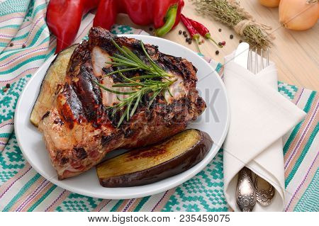 Ribs Grill On A Plate With Vegetables.