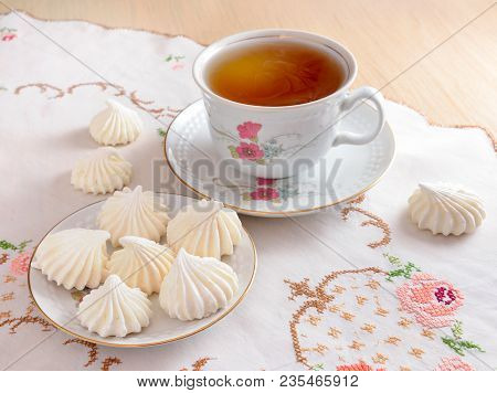 Still Life With Tea And A Meringue.