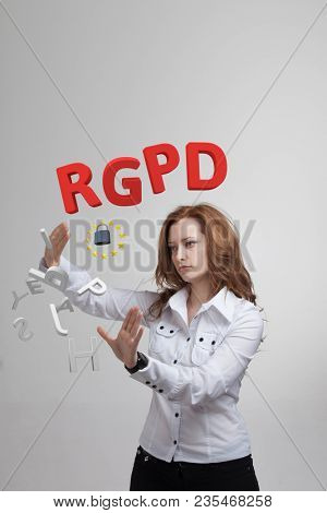 RGPD, Spanish, French and Italian version version of GDPR: Reglamento General de Proteccion de datos. General Data Protection Regulation. Young woman working with information.