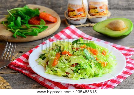Raw сabbage Avocado Salad. Easy Fresh Cabbage Salad With Avocado, Dried Apricots, Ruccola And Sesame