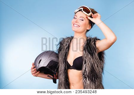 Winter Sport Activity Concept. Atractive Smiling Woman Wearing Black Bra, Ski Goggles And Furry Wais