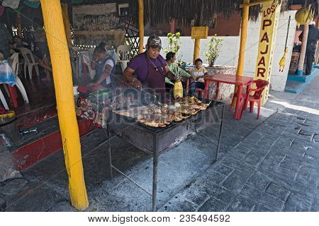 Piste, Mexico-march 19, 2018: Man At The Chicken Grill On The Roadside In Piste, Yucatan, Mexico