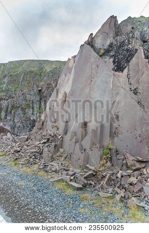 Rocky Cliffs On The Coast Of The Barents Sea Along The Varanger