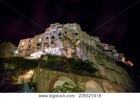 Buildings On A Cliff In Tropea By Night, Calabria, Italy