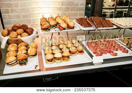 Close Up Of Mini Hamburgers At Catering Event.
