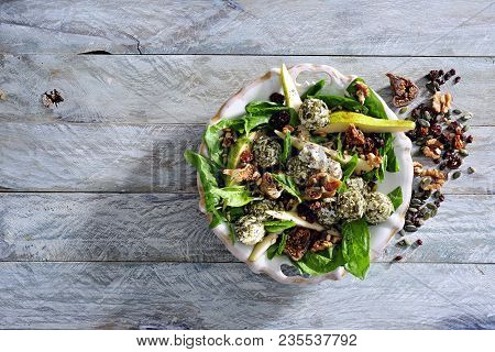 Spinach Salad With Cheese, Pear, Figs And Walnuts.
