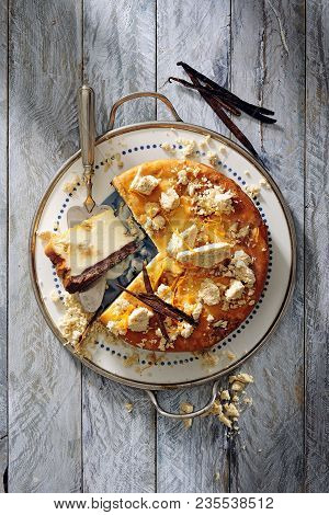 Baked Halvah Cheesecake Garnished With Halvah And Vanilla