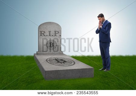 Businessman mourning the demise and death of bitcoin