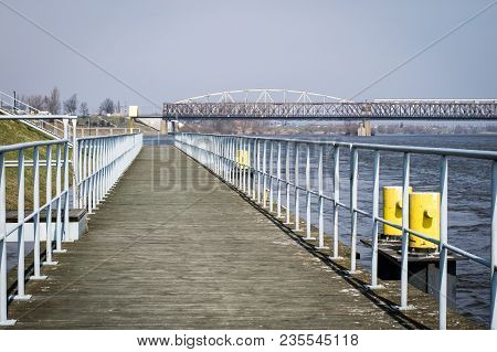 Bridge Crossing Across A Large River. Truss Bridge In The City Of Tczew In Poland.