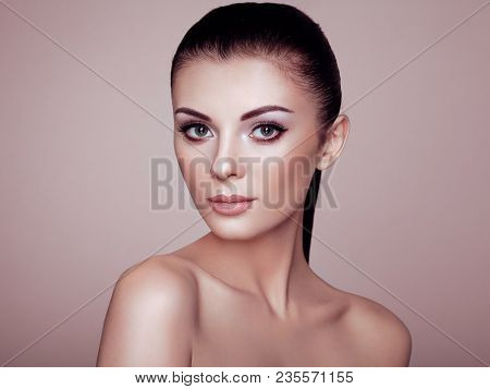 Beautiful Young Woman With Clean Fresh Skin. Perfect Makeup. Beauty Fashion. Eyelashes. Cosmetic Eye