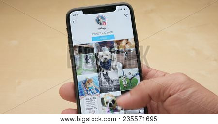 Hong Kong, Hong Kong, 05 March 2018:- Use of iphoneX with the hashtag of dog