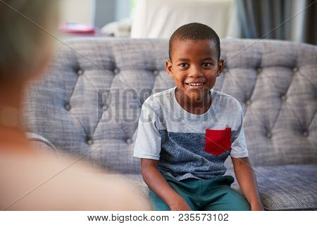 Young boy having therapy with a child psychologist