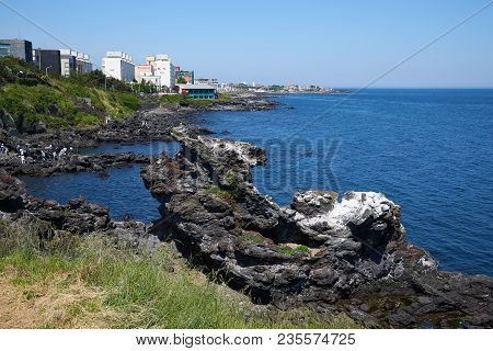 Jeju, Korea - May 22, 2017 : Yongduam Rock. Yongduam Is A Dragon Head-like Rock And A Famous Attract