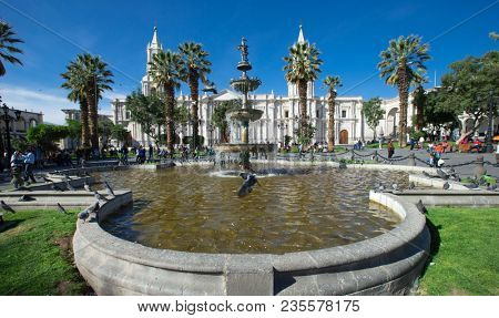 AREQUIPA PERU NOVEMBER 9: Main square of Arequipa with church on november 9 2015 in Arequipa Peru. Arequipa's Plaza de Armas is one of the most beautiful in Peru.