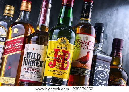 Poznan, Poland - Mar 30, 2018: Bottles Of Several Global Whiskey Brands, The Most Popular Liquor In 