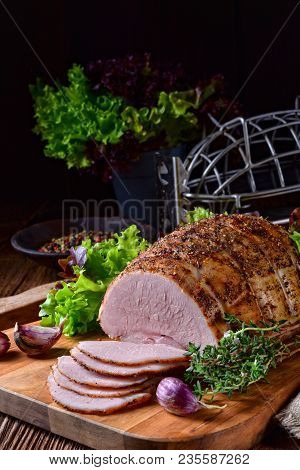 A Fresh And Tasty Cooked Ham With Colorful Pfefer