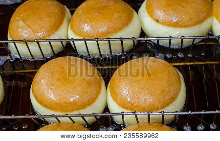 Preparation Of Donuts. Roasting In Boiling Oil. Cookng, Fried.