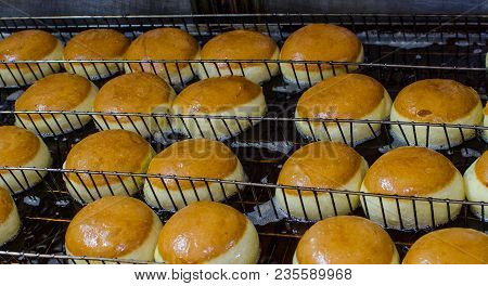 Preparation Of Donuts. Roasting In Boiling Oil. Cookng, Fried.