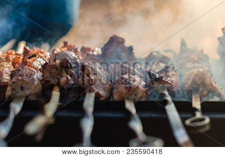 Clouse-up Photo Of The Tasty Shish Kebab On A Charcoal Grill.