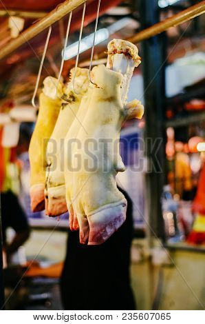Cow Foot Hanging In The Fresh Market