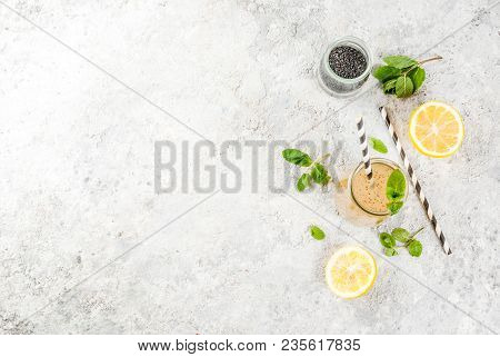 Natural Energy Drink, Chia Fresca, Infused Water Or Lemonade On Grey Stone Table Copy Space Top View