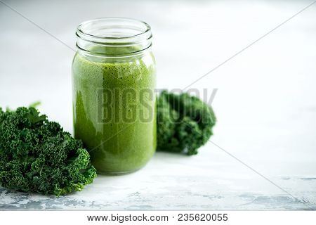Glass Jar Mugs With Green Health Smoothie, Kale Leaves, Lime, Apple, Kiwi, Grapes, Banana, Avocado, 