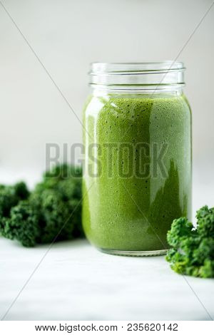 Glass Jar Mugs With Green Health Smoothie, Kale Leaves, Lime, Apple, Kiwi, Grapes, Banana, Avocado, 