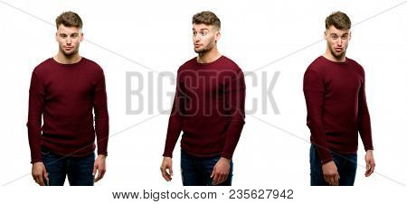 Handsome blond man making funny face fooling isolated over white background