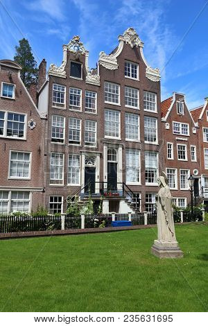 Amsterdam City Architecture - Begijnhof Residential Buildings. Netherlands Rowhouse.