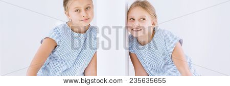 Happy Girl With Ear To Wall