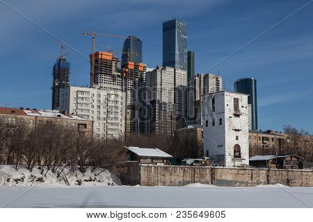Three Kind Of Old And Modern Buildings In One View.