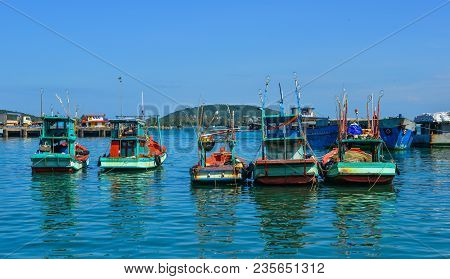 Boats Docking At Pier In Southern Vietnam