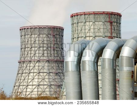 Large Cooling Pipes At The Thermal Power Plant.inside Them Steam Is Cooled And Condensed Water.