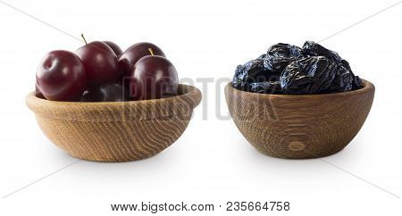 Fresh Plums And Dried Prunes Isolated On A White Background. Dried Prunes And Fresh Plums In A Bowl 