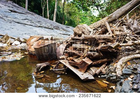 Natural Dam From Fallen Trees On Mountain River In Jungle