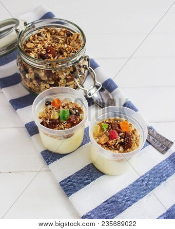 Homemade Granola Dried Fruits Oatflakes Wooden Table.