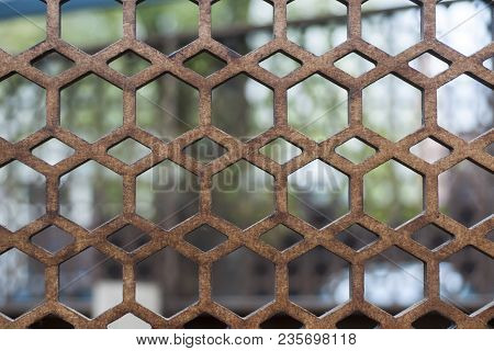 The Texture Of A Modern Wall With Multi-faceted Holes. Selective Focus.
