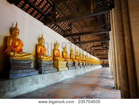 Travel Thailand -  Gloden Buddha Statue In Wat Phutthaisawan On Blue Sky And Cloud Background, Ayutt