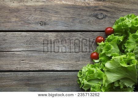 Fresh Garden Herbs On Wooden Table Board. Top View With Copy Space