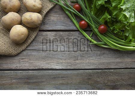 Fresh Garden Herbs On Wooden Table Board. Top View With Copy Space