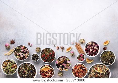Assortment Of Dry Tea In White Bowls. Tea Types Backgound: Green, Black, Floral, Herbal, Mint, Melis