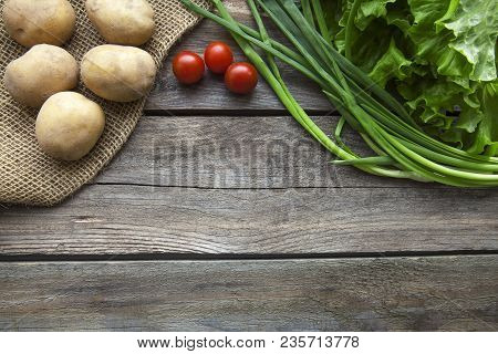 Fresh Garden Herbs On Wooden Table Board. Top View With Copy Space